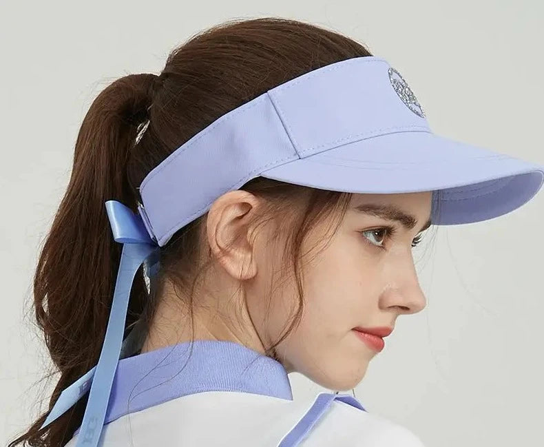 Side View of Attractive Lady in a Golf Cap